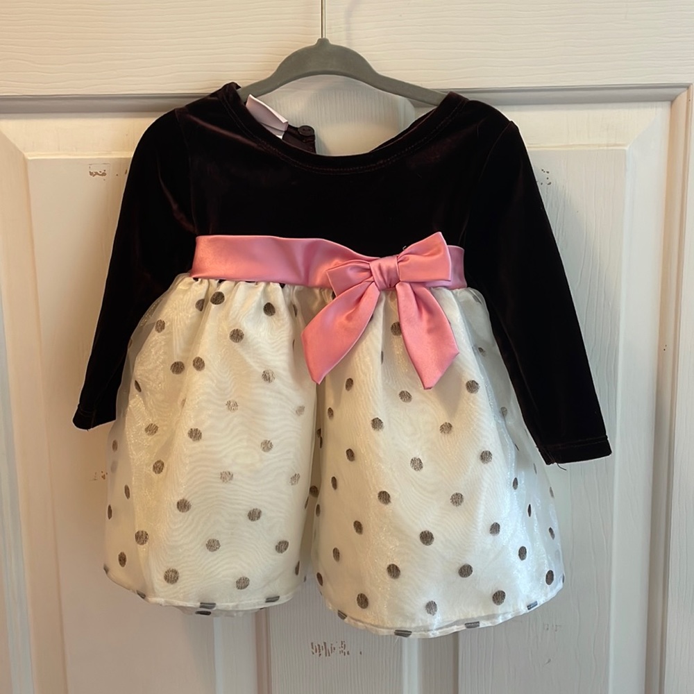 Brown and white dress with pink sash